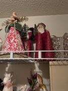 Contents of bedroom 1 closet include holiday decor, empty jewelry box, hangers, etc The white boxes are empty!