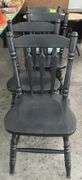 4 black painted chairs