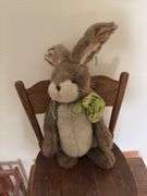 Doll crib, green wicker doll rocker, child’s table and chair