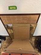 Wall mirror, cork boards, framed poster, etc