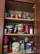 Tupperware, silverplate, cookbooks, glassware, coffee mugs, etc "A" cupboards