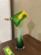 Jack in the Pulpit style glass stretch vase and genuine plastic flowers, not imitation plastic but genuine!!!