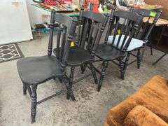4 black painted chairs