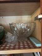 Tupperware, silverplate, cookbooks, glassware, coffee mugs, etc "A" cupboards
