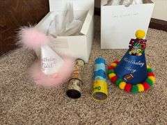 Two kaleidoscopes and BOY and GIRL birthday hats