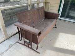 Vintage metal patio glider 56" wide. A classic!
