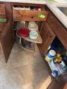 Kitchen utensils, plastic storage containers, cleaning supplies “E” cupboards
