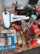 4 x 8 sheet of plywood full of tools and household maintenence items