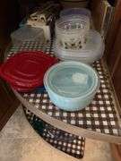 Kitchen utensils, plastic storage containers, cleaning supplies “E” cupboards