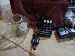 Luggage, retro hairdryer, landline phone, fish bowl, shoe rack, etc