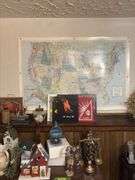 Shelf and contents includes decorative birdhouses, deco scale, bottles, trophies, etc