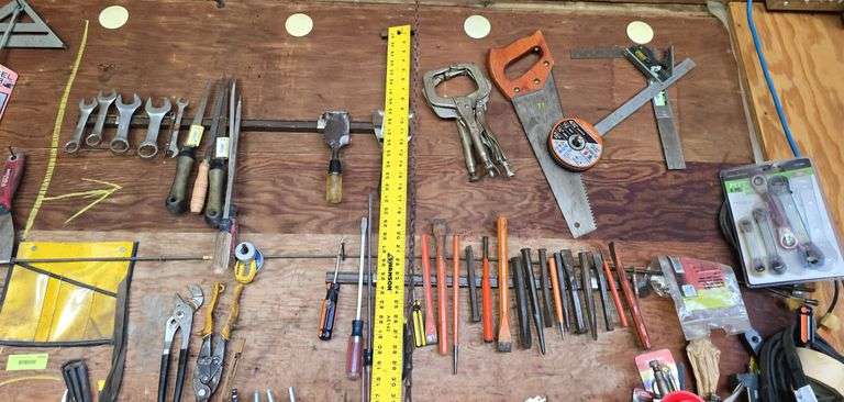 Screwdrivers, chisels, offset wrenches, ruler, saws, etc image