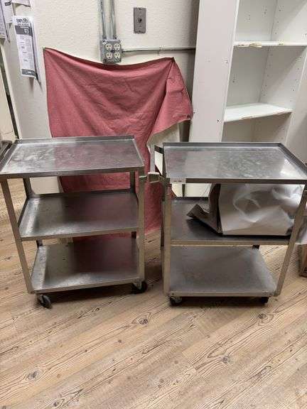 Two stainless serving carts on rollers image