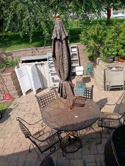 48" patio table, 4 chairs and umbrella image