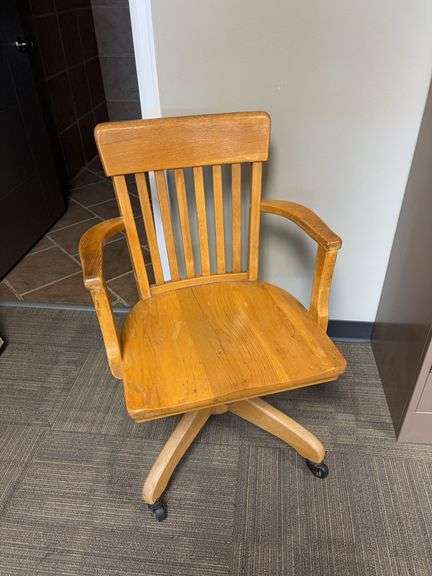 Vintage wood swivel office chair image