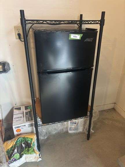 Arctic king apartment fridge and shelving unit image