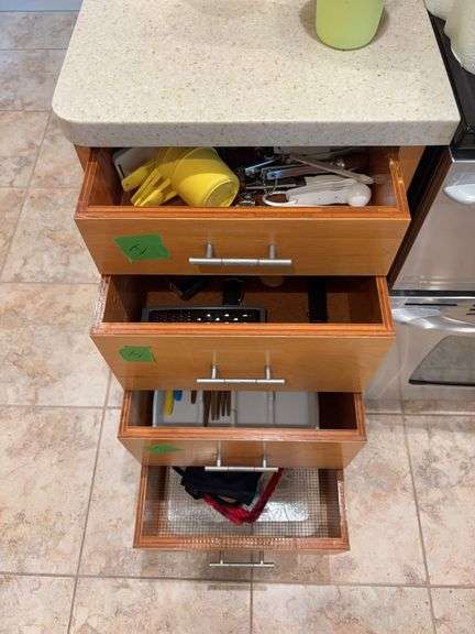 Kitchen utensils, flatware, hot pads, grill tools, etc “I” drawers image