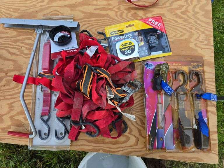 Tie downs, Stanley tape measure, oil filter wrench image