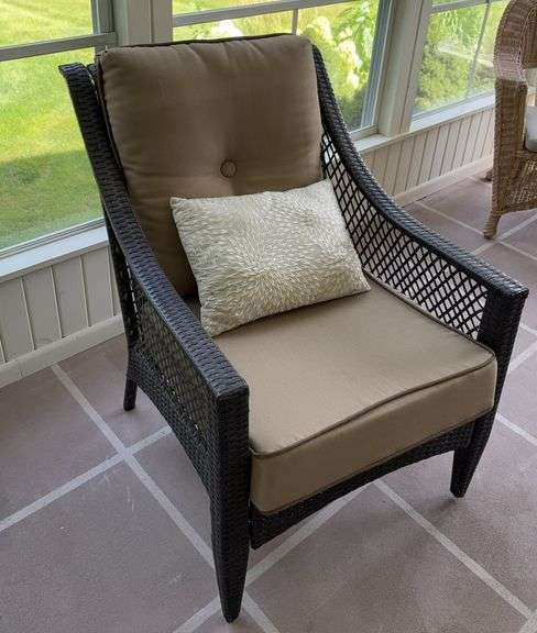 Brown plicker arm chair image