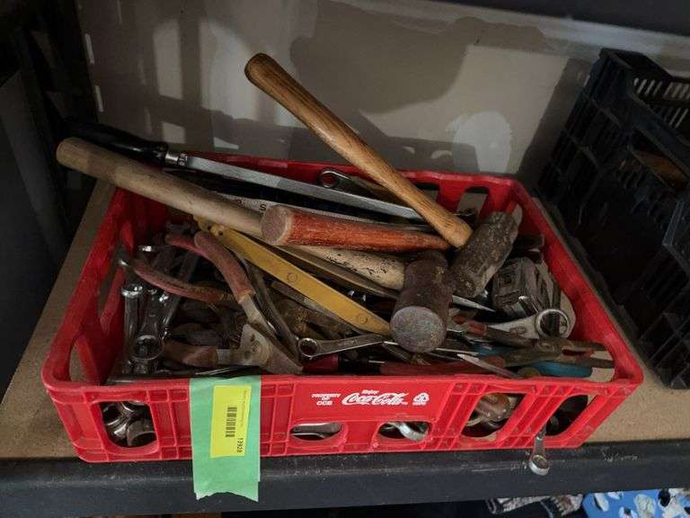 Coke crate full of tools image