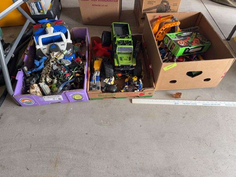 3 boxes of various toys image