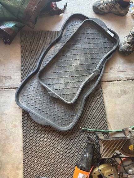 Two plastic boot drying trays and two shop fatigue mats image