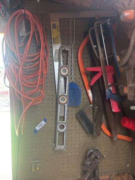 Level, Cords, saw, bar, pipe wrench, square image