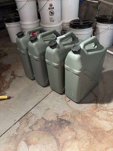 Four plastic jugs image