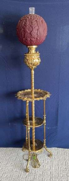 Approx 5’ tall organ lamp w probably Fenton crimson satin glass shade, electrified image