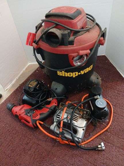 Small shop vac, sabresaw, elec drill and inflator image