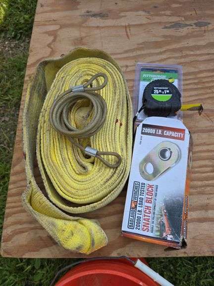 Snatch block, tape measure, tow rope image