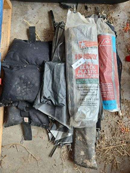 Two Rolls of Plastic Sheeting, Weight Bags, Umbrellas image