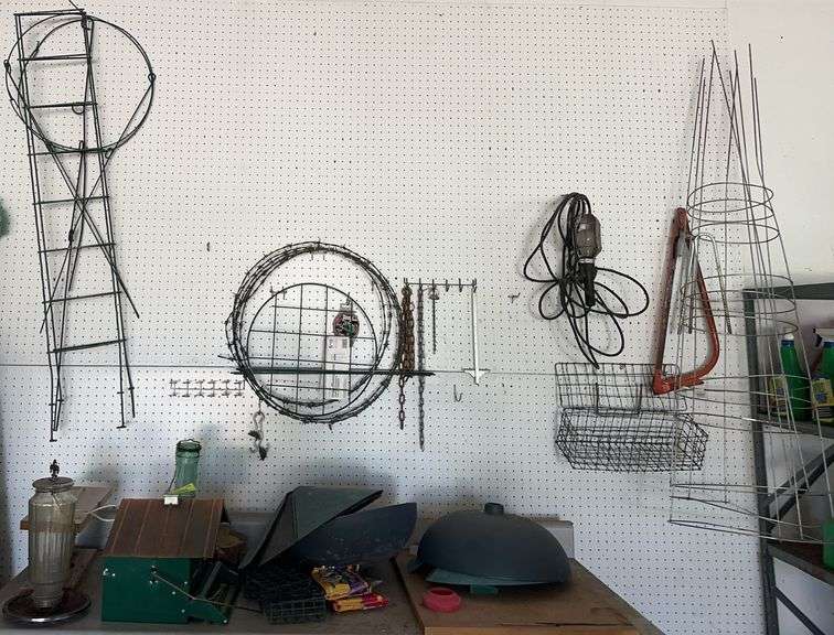Bird feeders, metal plant trellis, tomatoe cages image