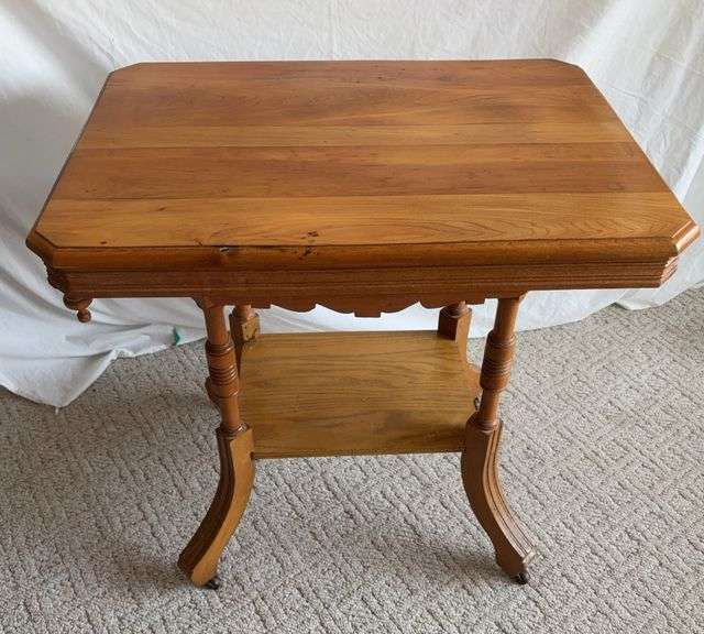 22x30x30H parlor table on wooden wheels image