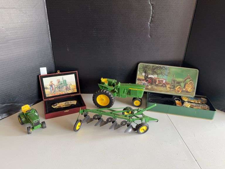 Tractor, plow and pocket knives image