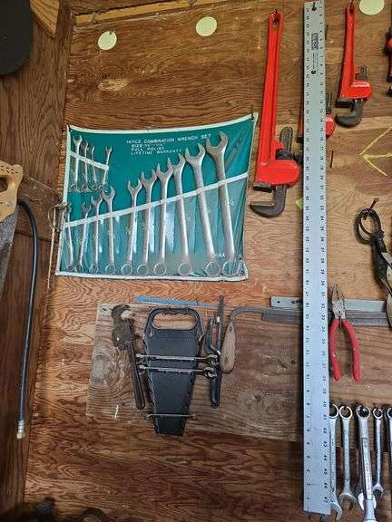 Combination wrenches, pipe wrenches, snips, ruler image