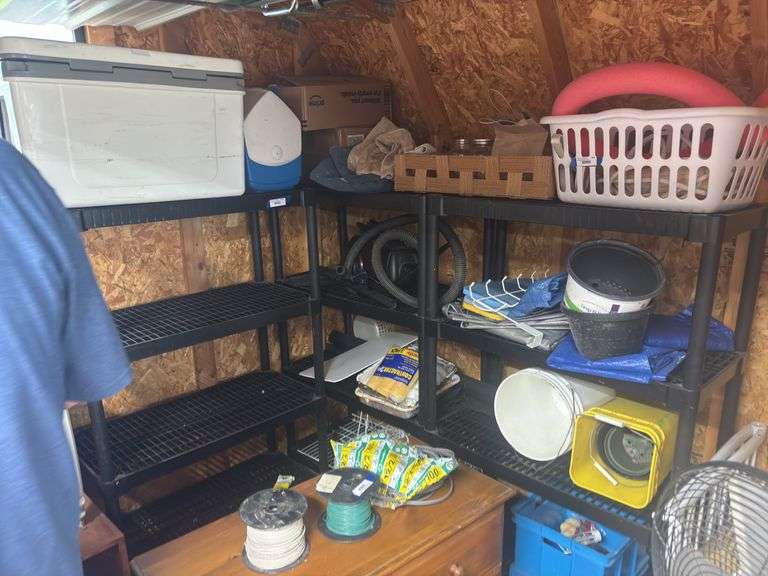 Three plastic shelving units - no contents image