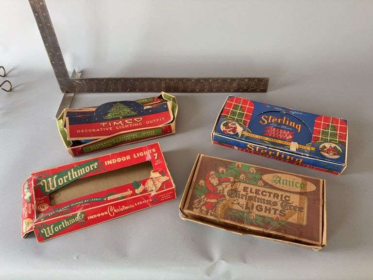 Four Christmas bulb boxes, one with lights image