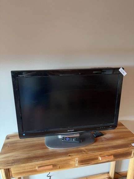Sharp 32”  TV with roku and remote image