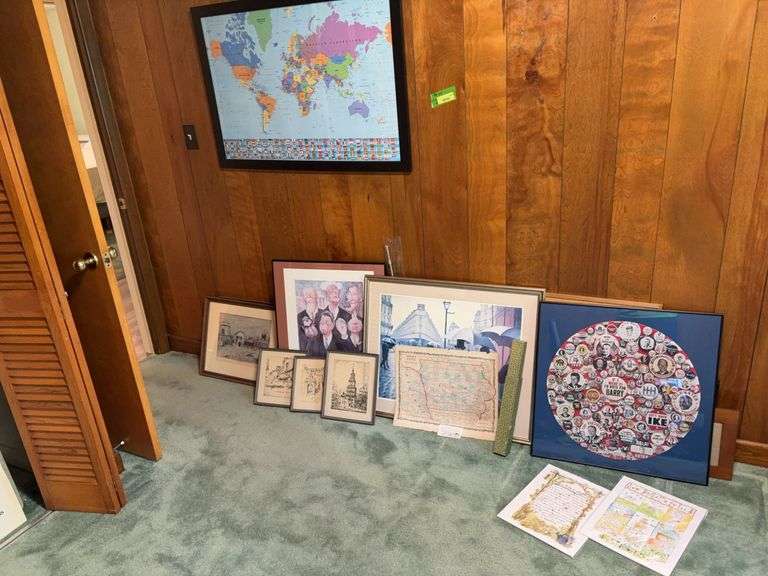 Many pieces of wall art including framed presidential puzzle, framed “Seven Presidents:The Art of Oliphant” Museum of the Jimmy Carter Library, three artist proof etchings, Iowa map, etc image