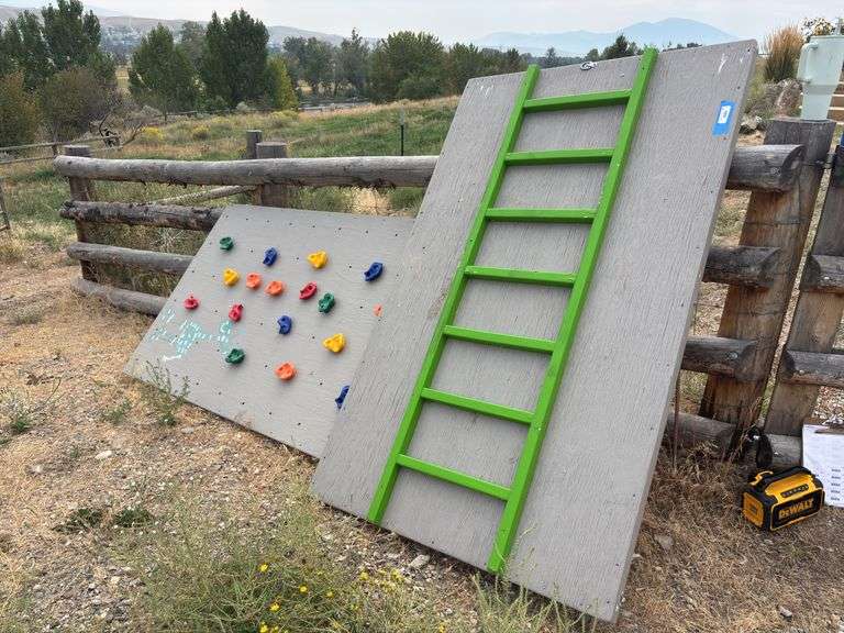 Homemade A-frame style, hinged, rock and ladder climbing wall image