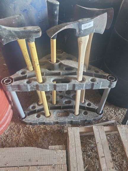 Axes on stand with stand (we recommend wearing mask and gloves to remove this item) image