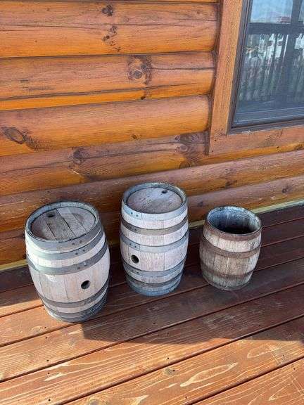 Three small wood barrels image