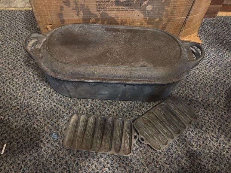 Cast-iron fish fryer and two tiny cast-iron cornbread pans image