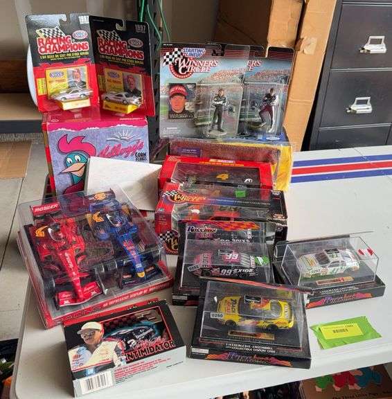 NASCAR and Formula cars and Action figures image