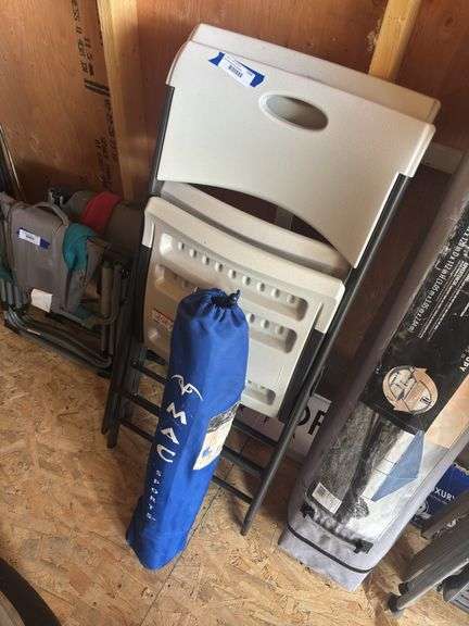 Two Lifetime plastic folding chairs and one bag chair image