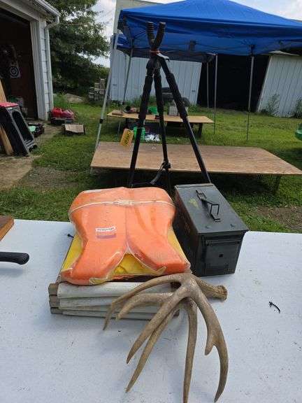 White tail antlers, ammo box, life jacket, camp seats, shooters rest image
