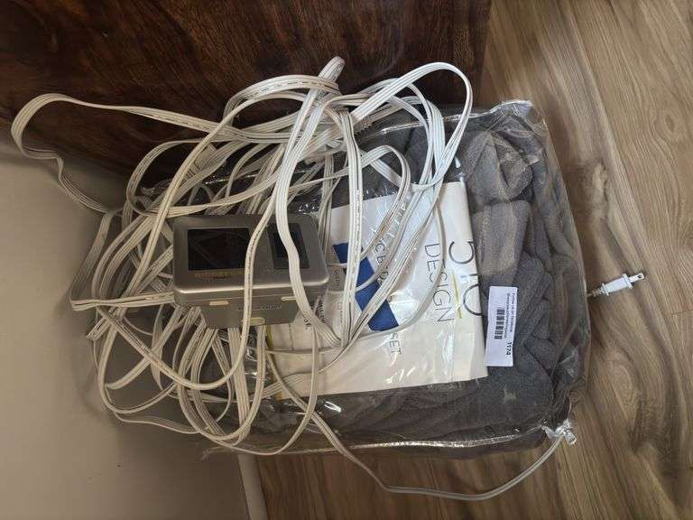 Heated blanket with dual control image