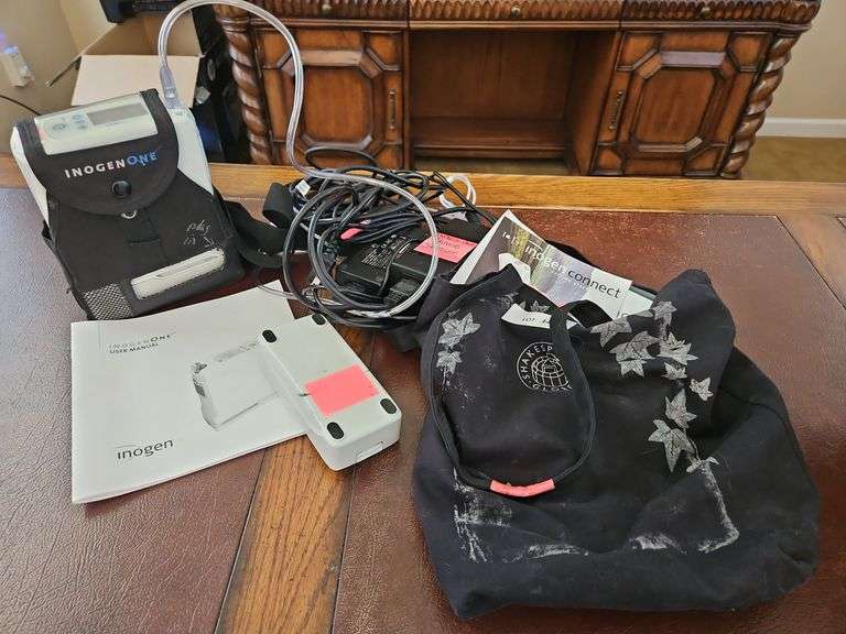 Inogen One G4 Portable Oxygen Concentrator in a carrying case, Chargers, Battery, Powers On image
