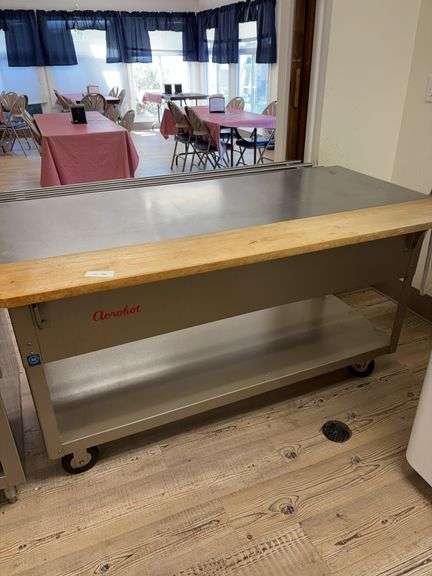 Aerobic serving table 58” long in rollers image